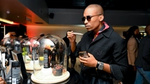A lineup of AXE deodorant sprays displayed, influencer guests and interactive scent station